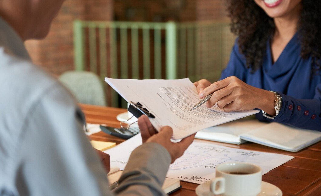 Employees discussing global translation services