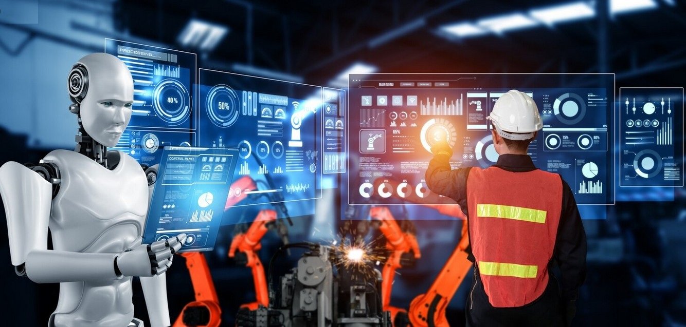 robot and engineer at a factory