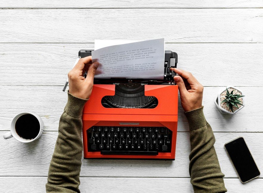 a person working on a typewriter